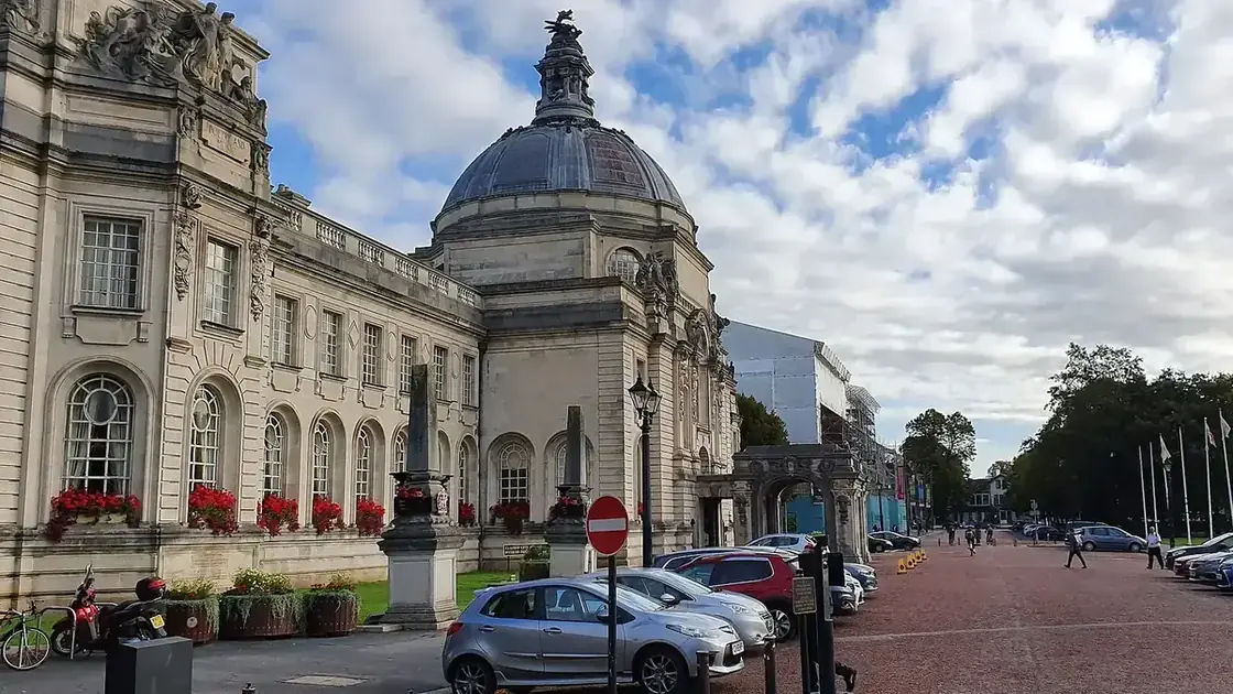 Cardiff City Hall's Portland stone frontage, clock tower and formal approach.
